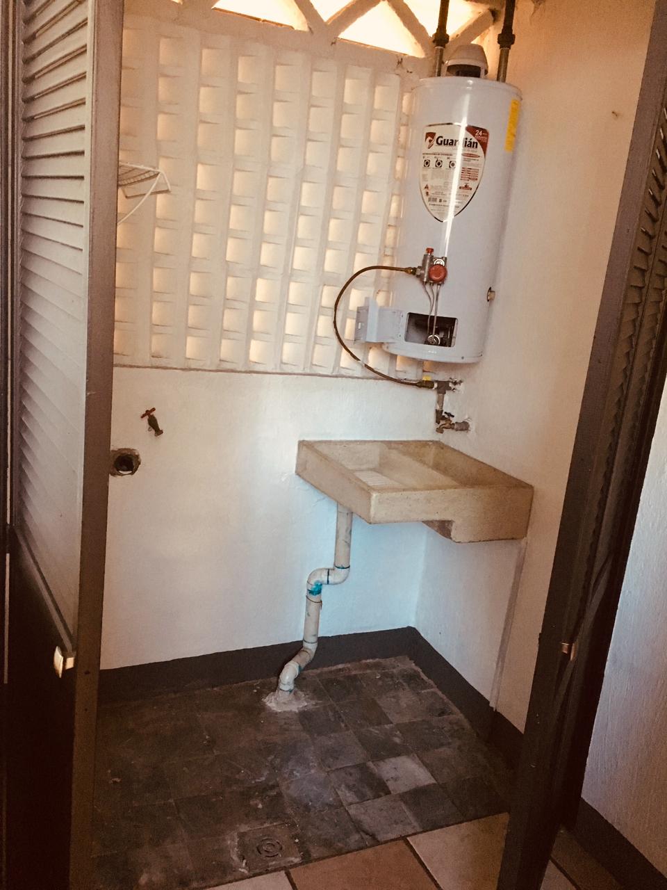 Área de lavado con boiler
